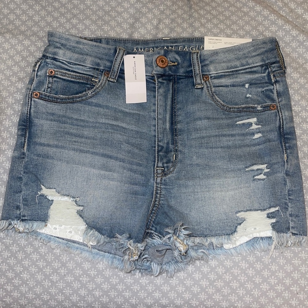Brand is American Eagle. US size 6, new with tags. Super Stretch/Curvy High-rise
